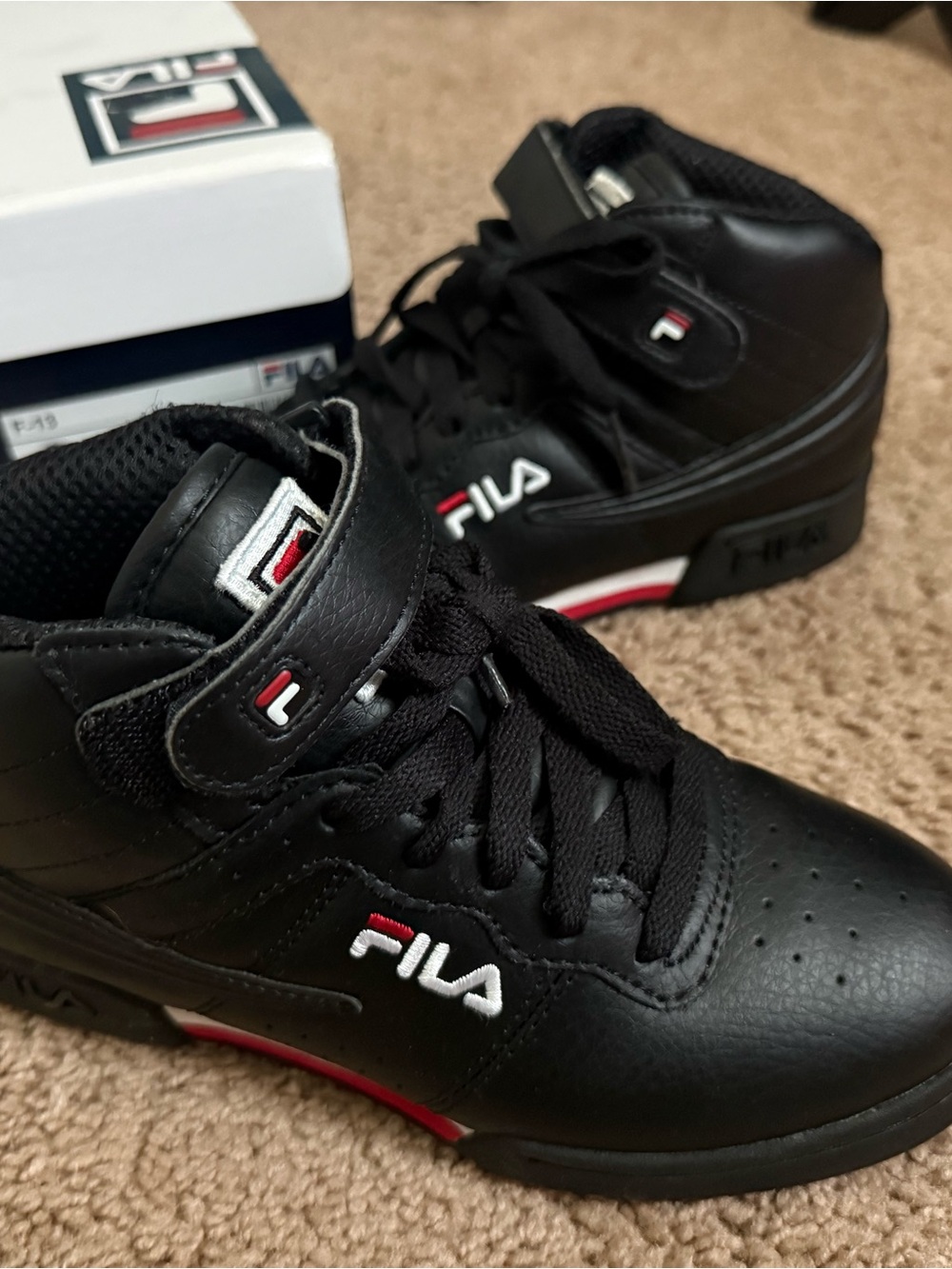 Fila Black High-Top Sneakers with Red and White Accents